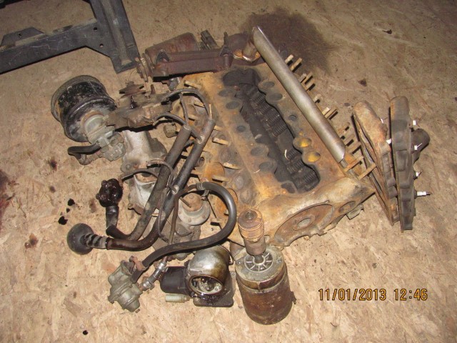 V8 60 pile of parts